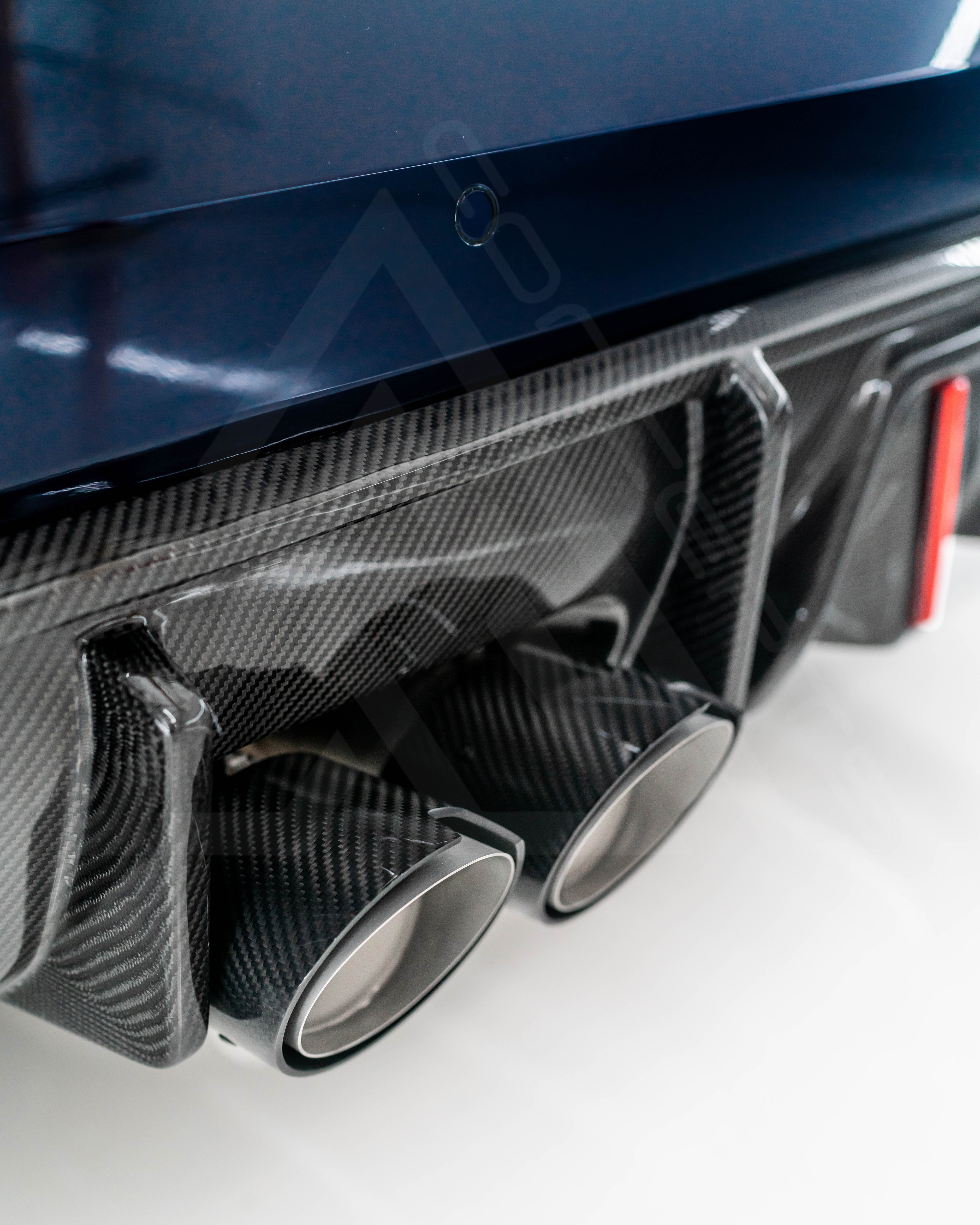 Carbon Fiber LED Rear Diffuser – BMW G80 M3 / G82 G83 M4 | Eterna Motorworks