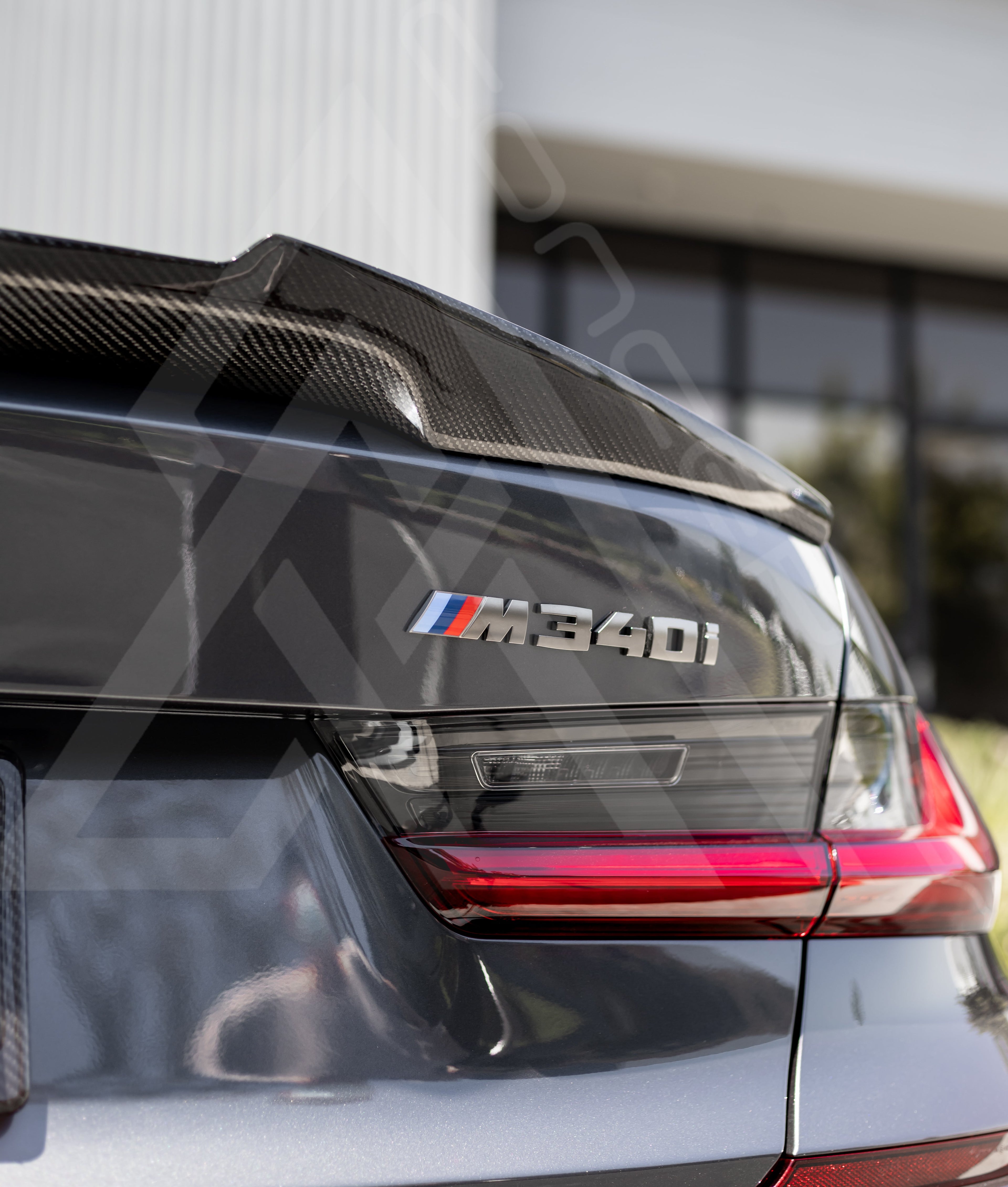 M4-Style Carbon Fiber Trunk Lip Spoiler – BMW G20 / G80 | Eterna Motorworks